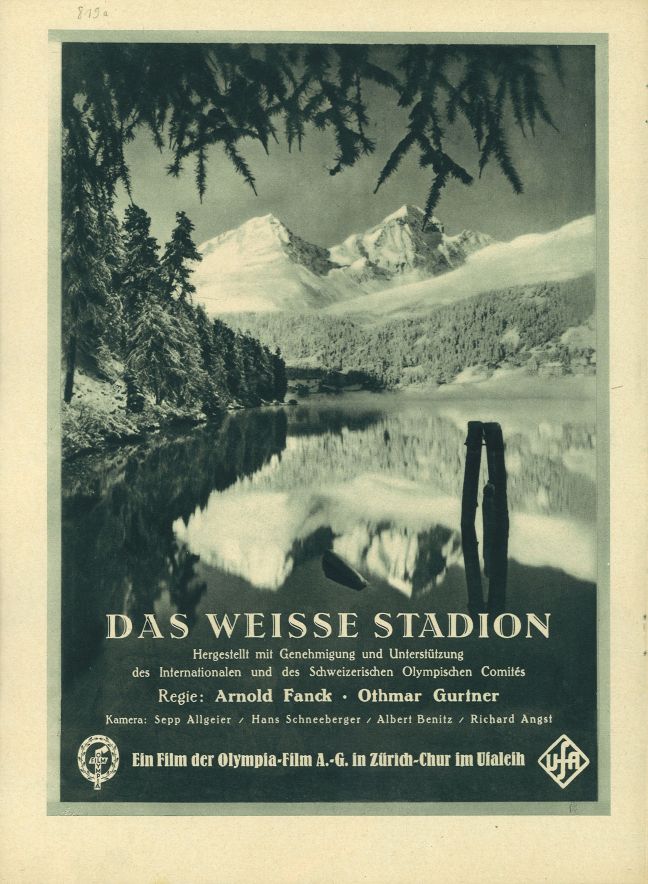 Filmplakat mit dem Titel „DAS WEISSE STADION“ und Nennungen der verschiedenen Mitarbeiter. Im Hintergrund ein mit Schnee bedeckter Berg hinter einem See.